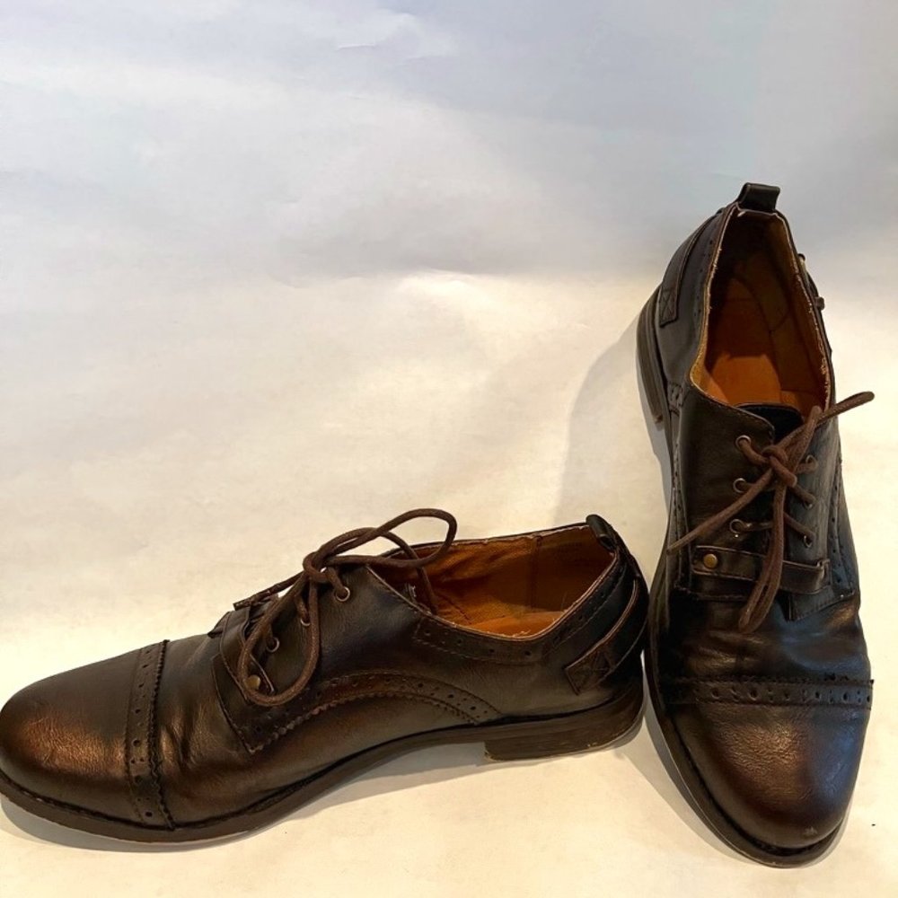Brown/bronze loafers with lots embellishments!